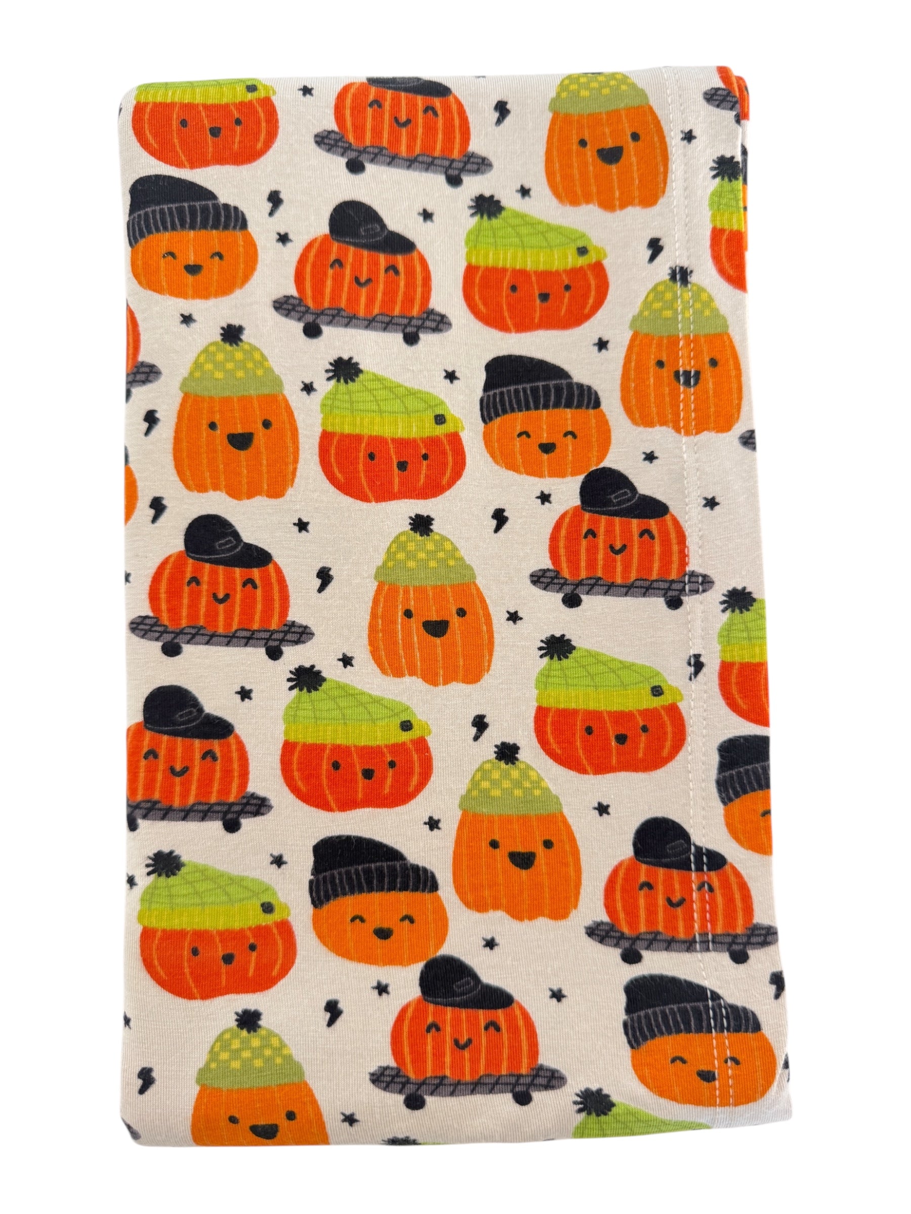 Smiling pumpkins in hats on a light background, perfect for autumn decor or festive events.