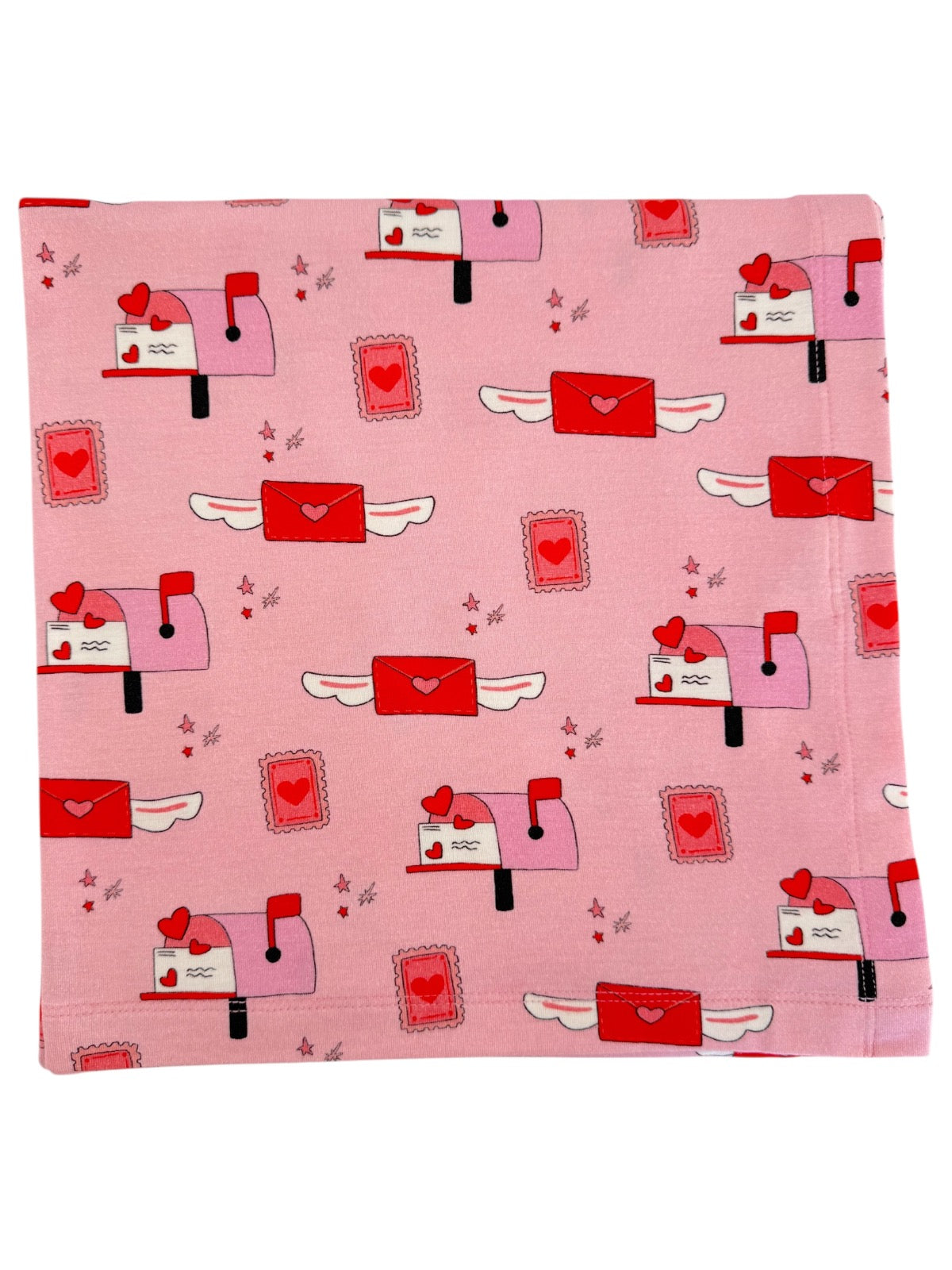 Pink fabric featuring playful mailboxes, love letters, and heart-themed designs. Perfect for Valentine's decor.