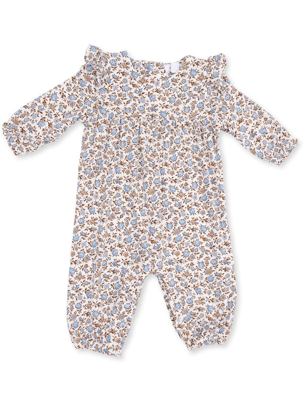Floral baby romper with off-shoulder design, featuring blue flowers on a white background and elasticized cuffs.