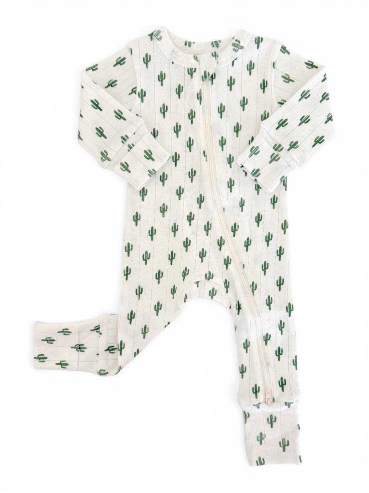 Cactus-themed baby onesie with long sleeves and a zipper, featuring a soft, cream background.