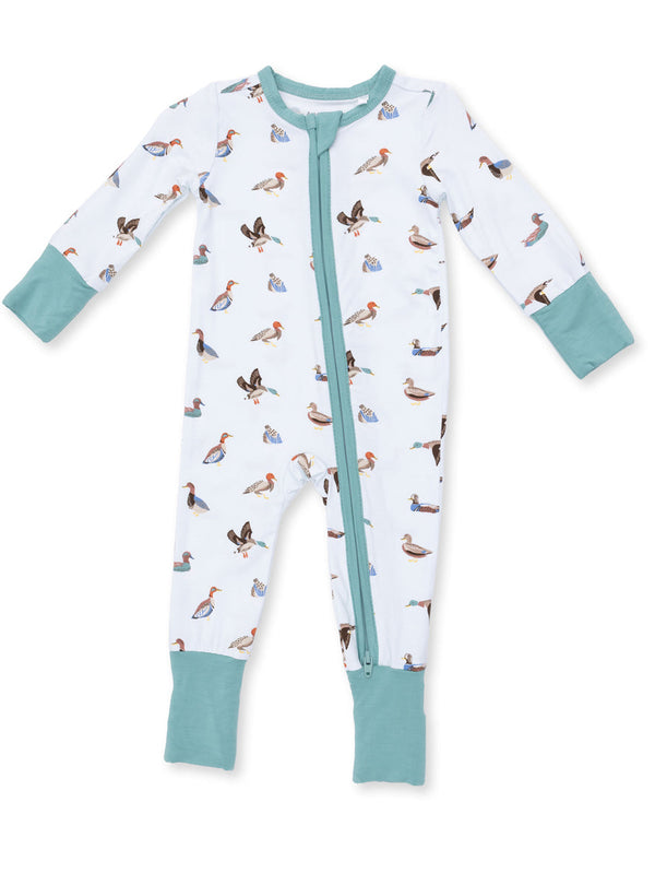 White baby onesie with bird prints and teal cuffs, featuring a front zipper closure.