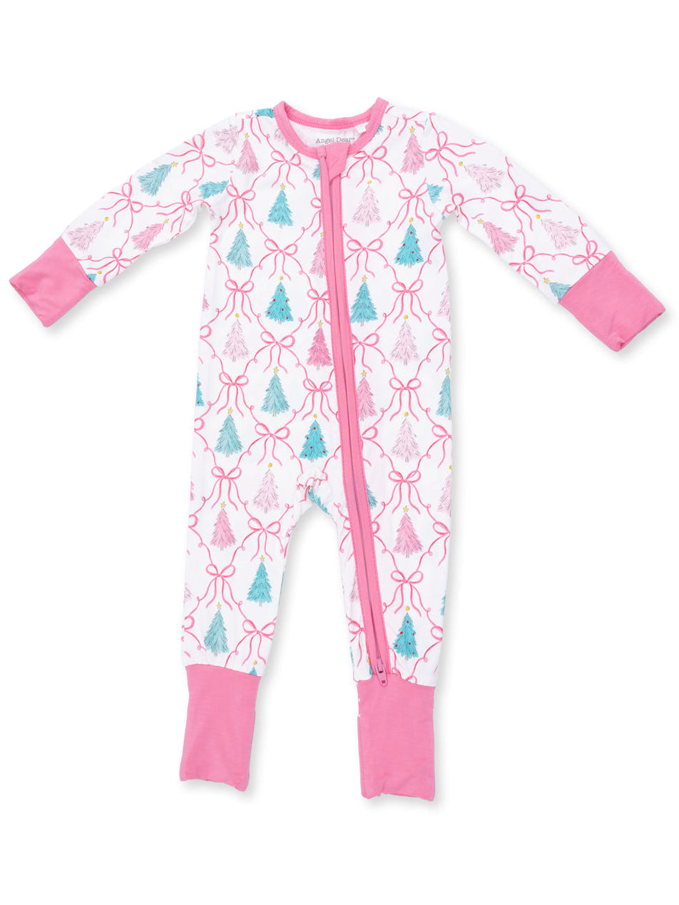 Pink and white onesie with Christmas tree and bow patterns, featuring a front zipper and footed legs.