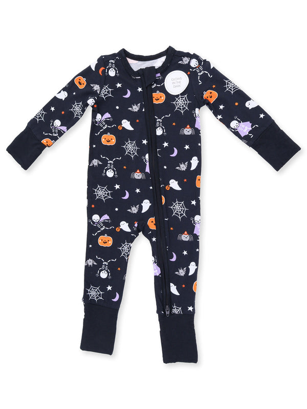 Halloween-themed baby onesie with ghosts, pumpkins, and spiders, featuring a glow-in-the-dark design.