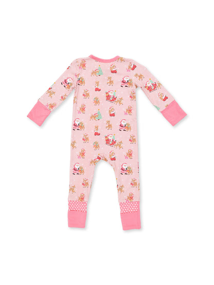 Pink toddler pajama with festive Santa and reindeer print, featuring long sleeves and polka dot cuffs.