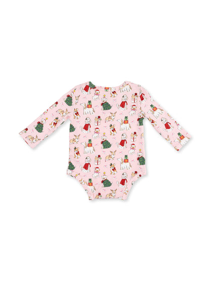 Long-sleeve baby bodysuit in pink with colorful holiday-themed illustrations of children and animals.