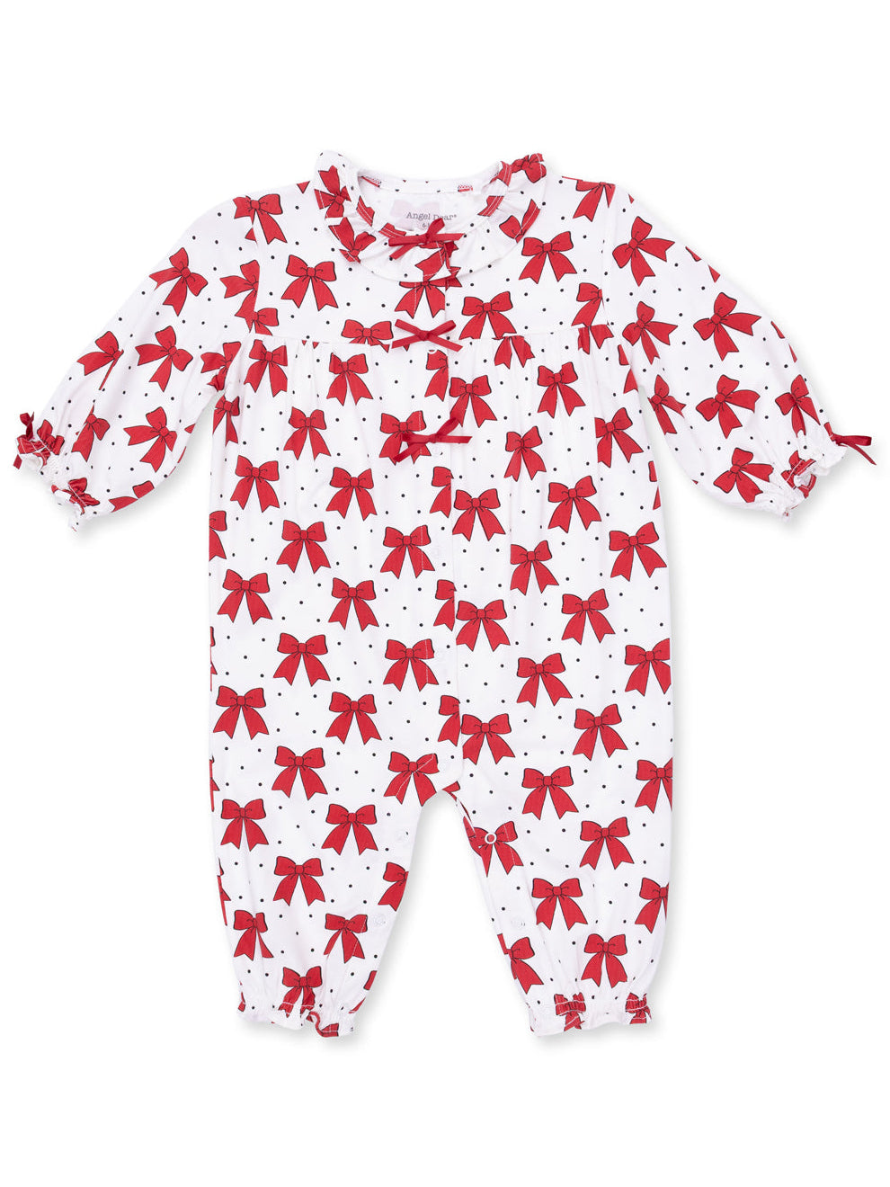 White baby romper with red bows and polka dot pattern, featuring gathered sleeves and collar.