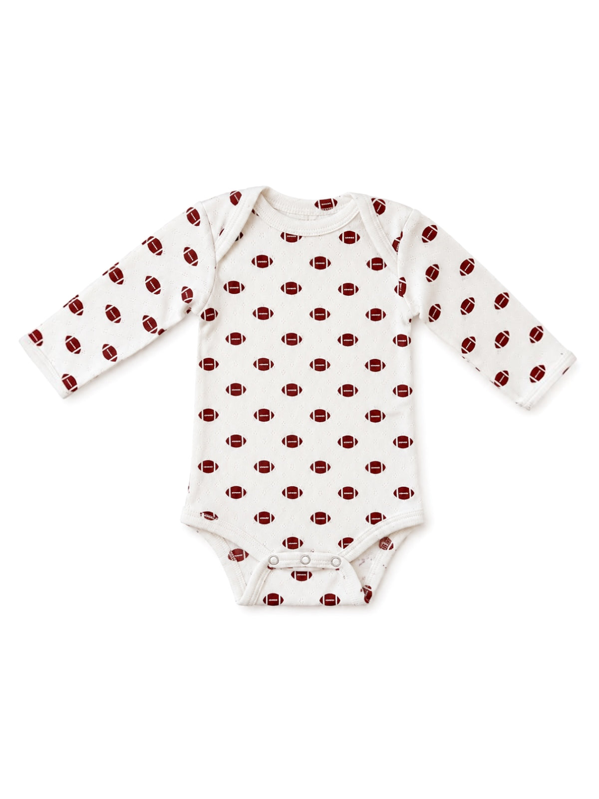 White long-sleeve onesie with red football print, featuring snap closures at the bottom.