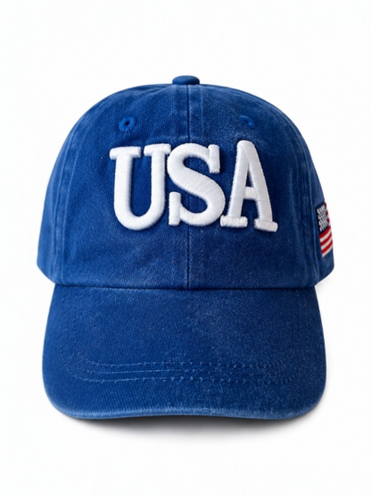 Blue baseball cap featuring "USA" in white letters and a small American flag on the side.