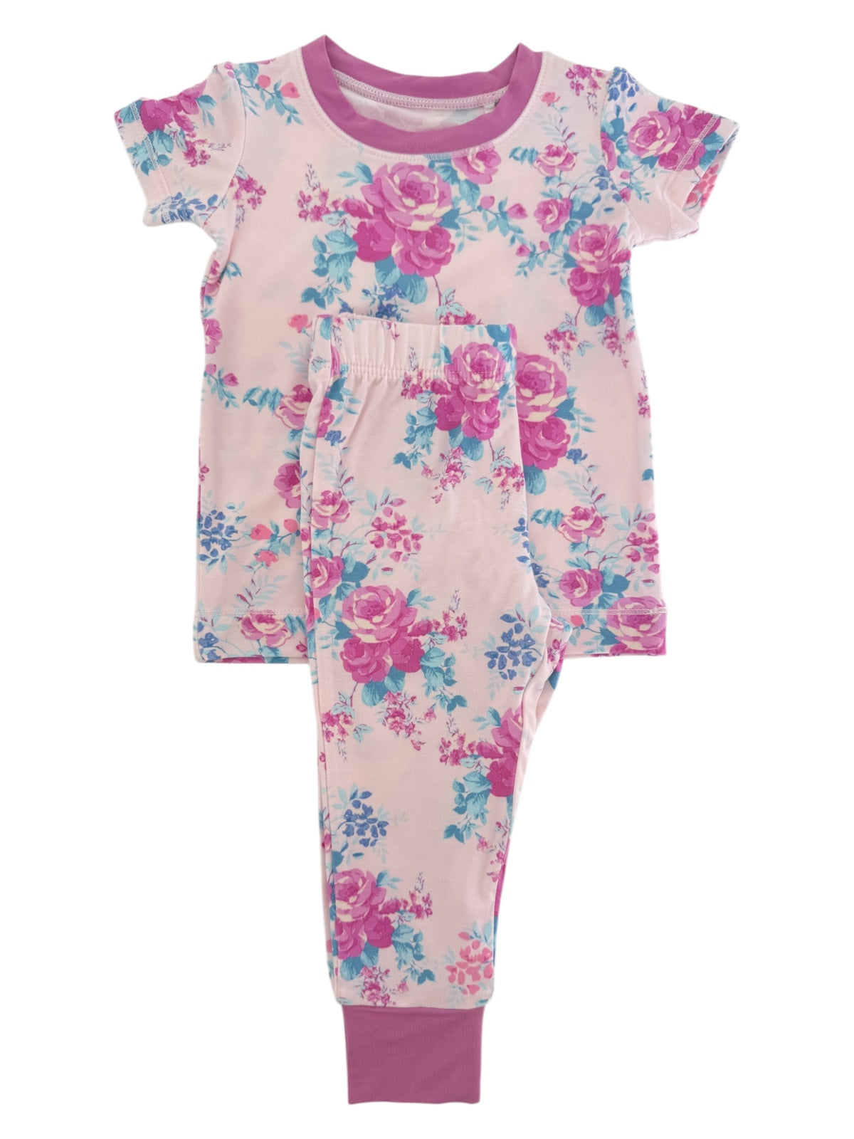Floral children’s pajama set featuring a short-sleeve top and matching pants in pink and blue tones.