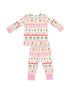 Christmas-themed kids' pajamas with gingerbread houses and festive patterns in pink and green.