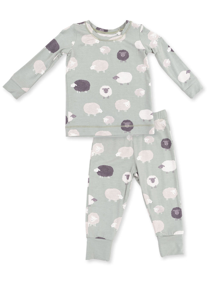 Green pajama set featuring playful sheep designs on both the long-sleeve top and matching pants.