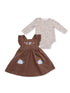 Brown floral dress with ruffled straps and a floral long-sleeve onesie, ideal for infants.