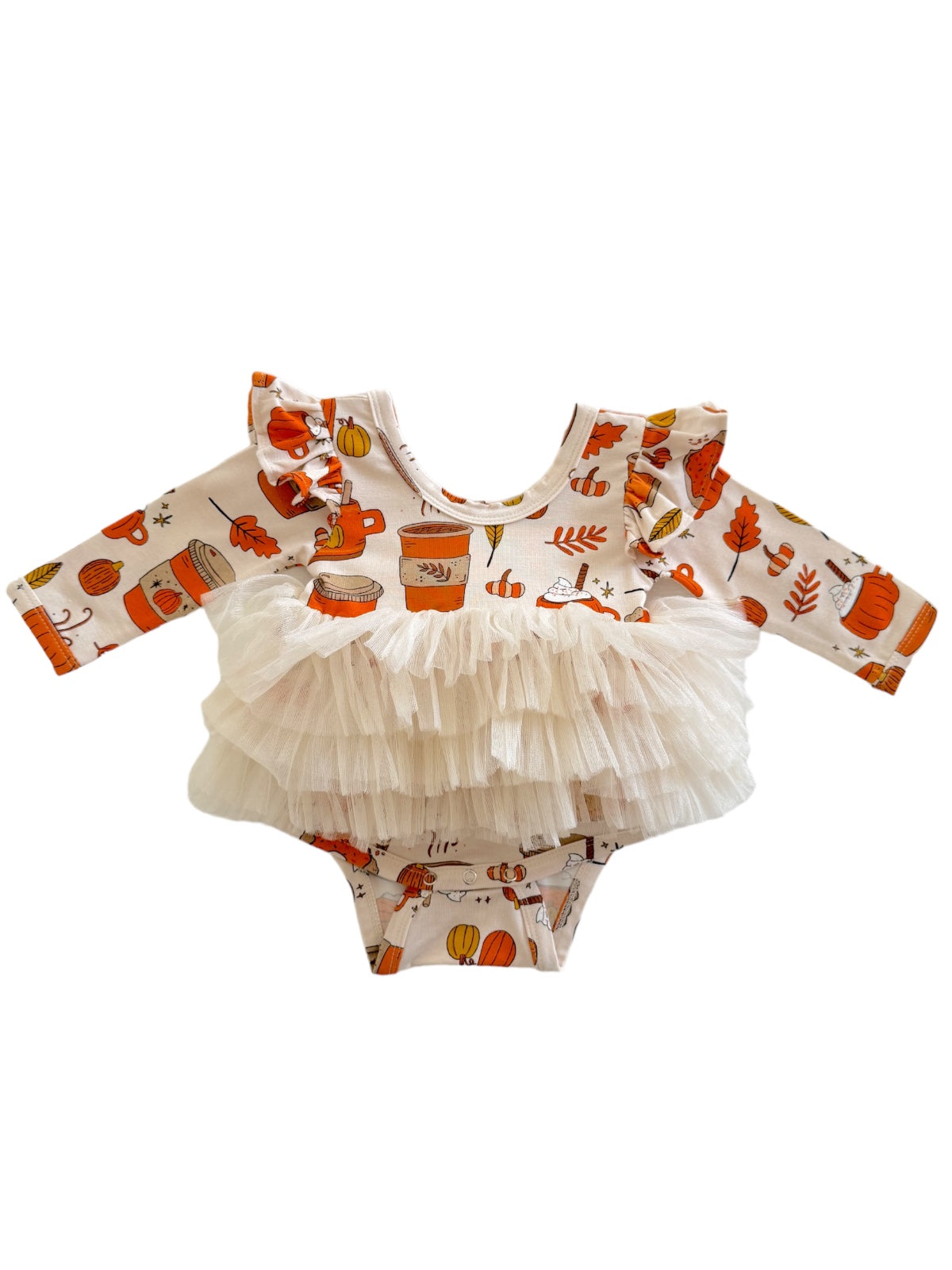Toddler outfit with fall-themed print and ruffled sleeves in shades of orange and cream.
