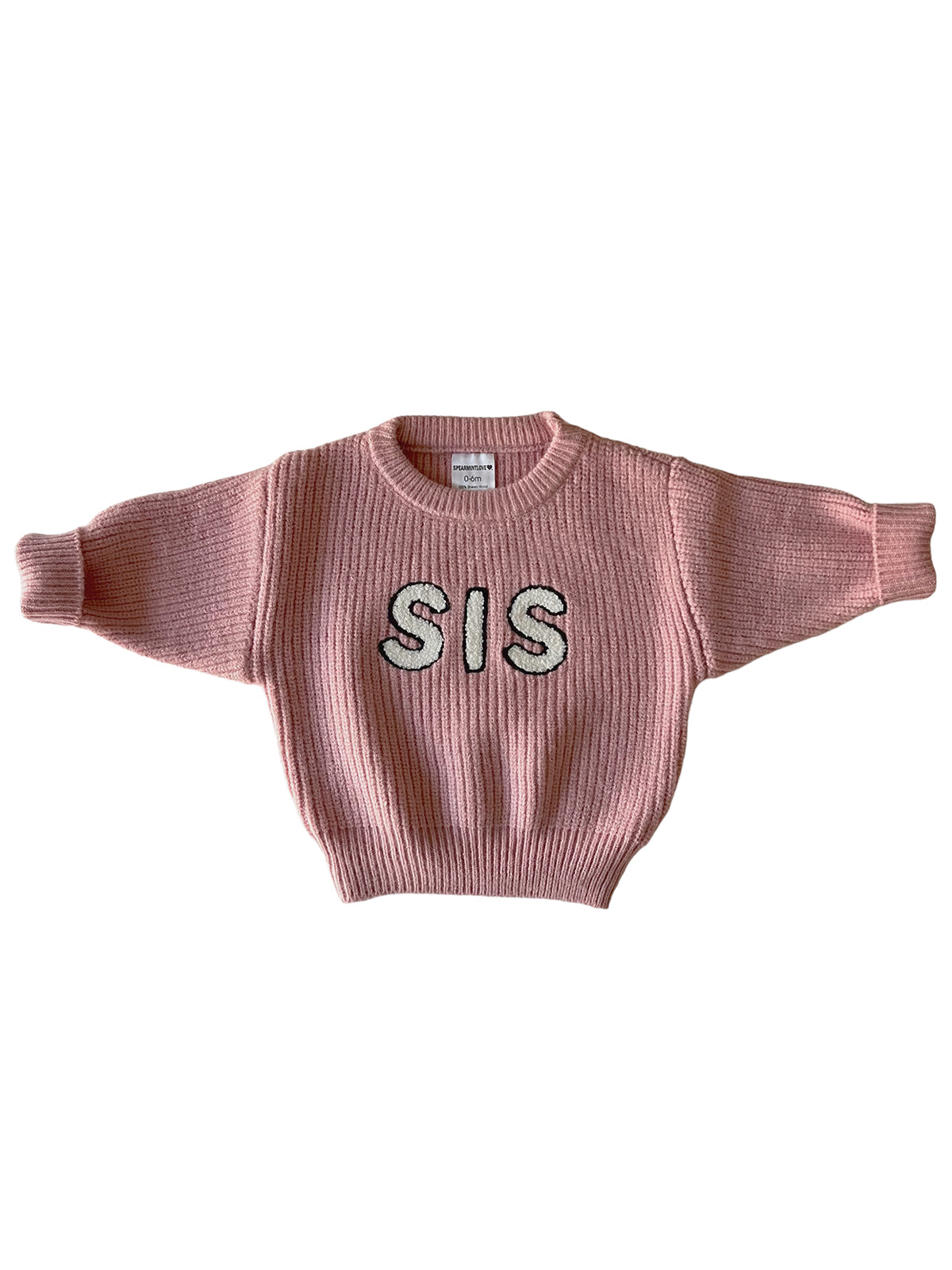Pink knit sweater with "SIS" embroidered on the front in sparkly letters.