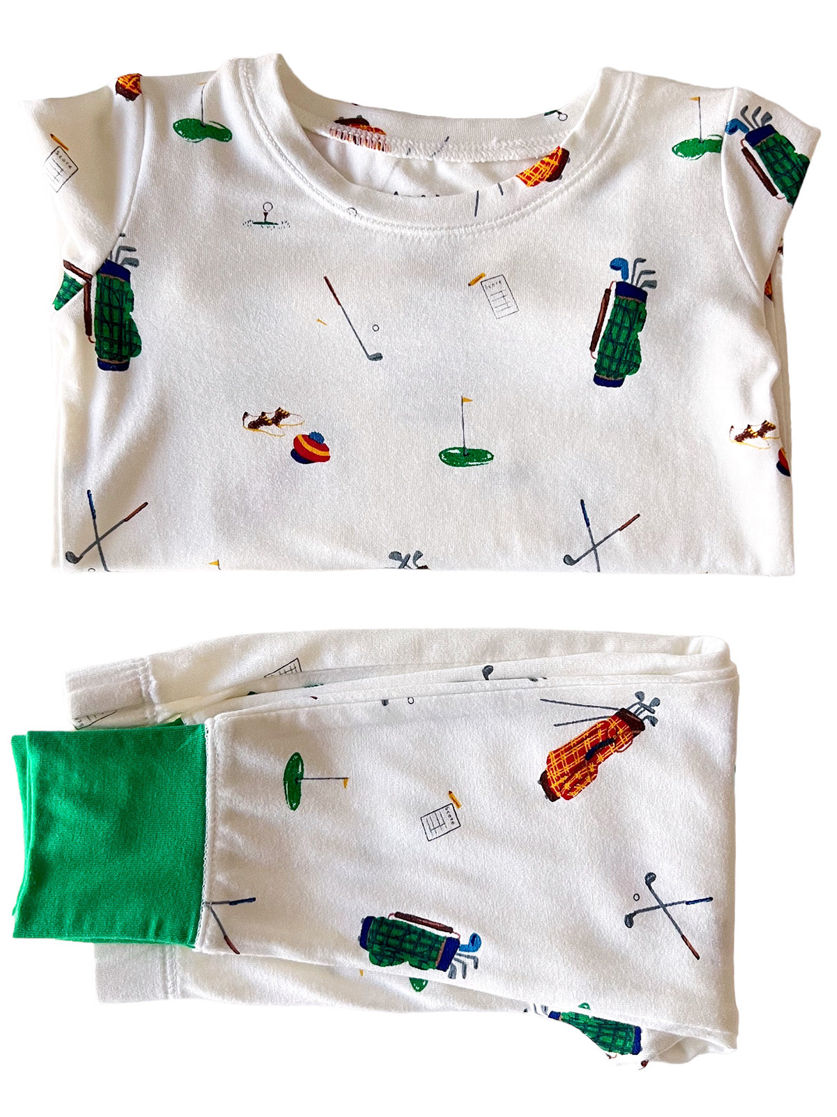Children's golf-themed pajama set featuring playful patterns of golf clubs, balls, and accessories.