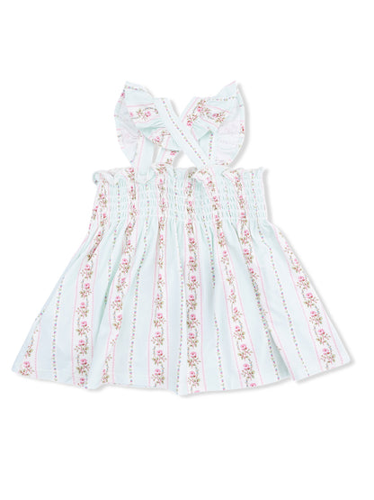Light blue floral dress with smocked bodice and tie straps, featuring pink and green striped accents.