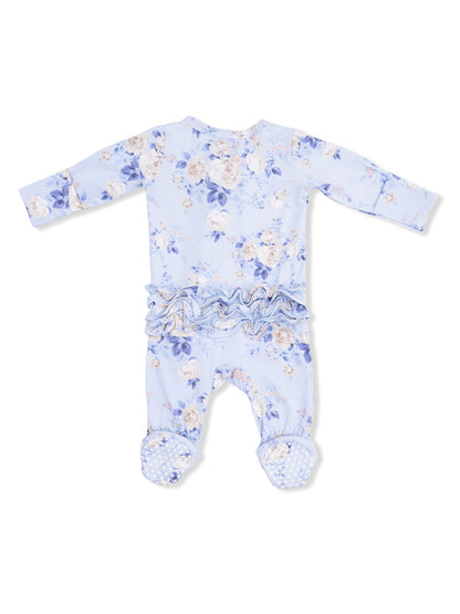 Light blue floral baby onesie with long sleeves and ruffled back detail, featuring polka dot grips on the feet.