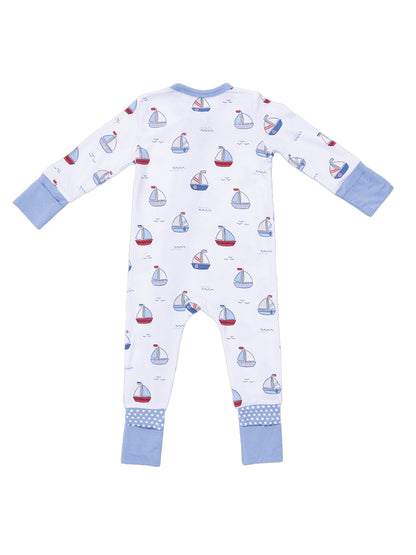 Back view of children's pajama set featuring colorful sailboats on a white background with blue sleeves and cuffs.