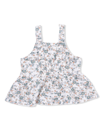 Floral pattern sleeveless top with a ruffled hem and smocked front, ideal for casual summer wear.