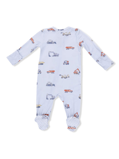 Light blue children's onesie featuring colorful construction vehicle prints and polka-dotted foot covers.