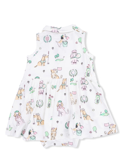 White dress featuring colorful dog illustrations and playful designs on a flared skirt.
