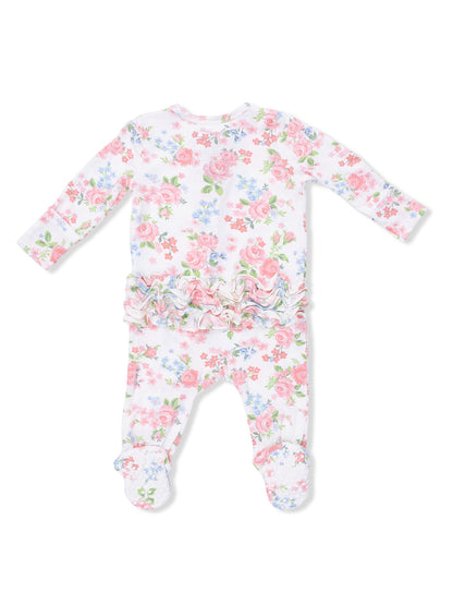 Floral print infant onesie with long sleeves and ruffled details at the waist, featuring footed legs.