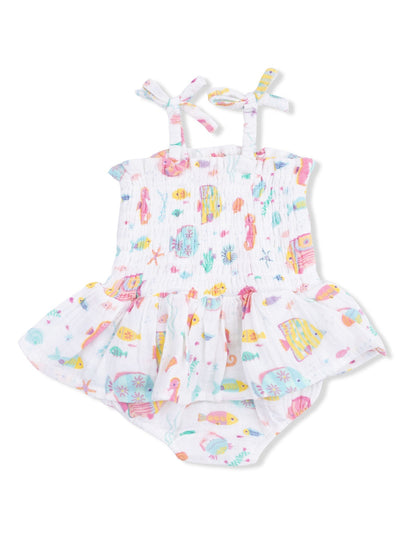 Colorful toddler sundress with fish and sea-themed prints, featuring adjustable straps and a ruffled hem.