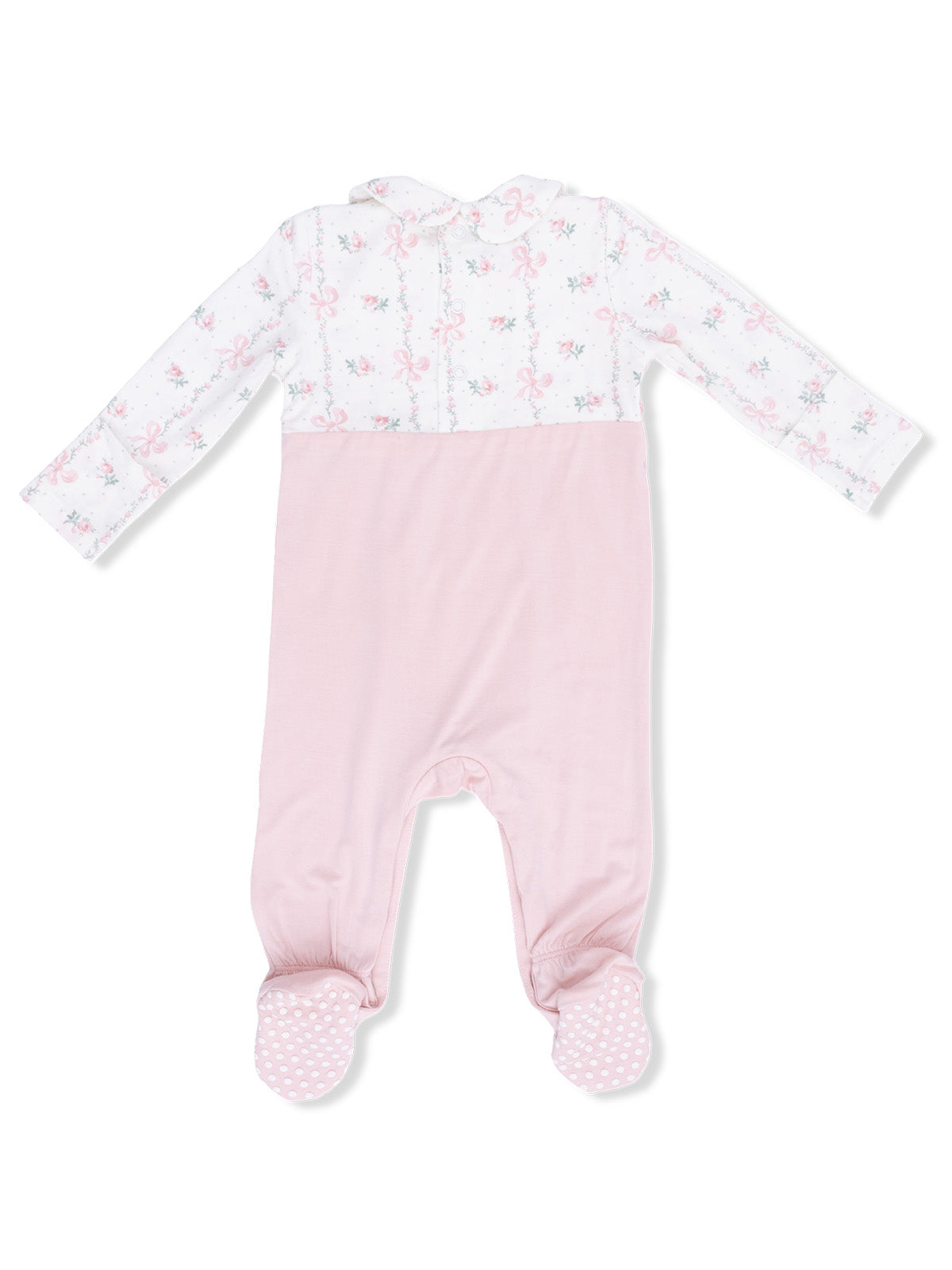 Pink baby romper with floral pattern on top and solid pink bottom, featuring footed design and long sleeves.