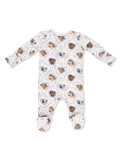 White baby onesie with a playful animal print featuring various illustrated dogs.