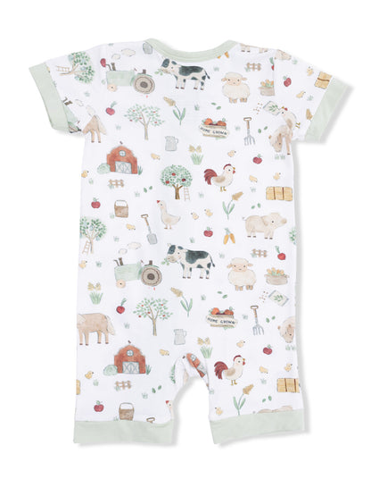 Children's farm-themed romper with animals, barns, and agricultural designs in soft colors.
