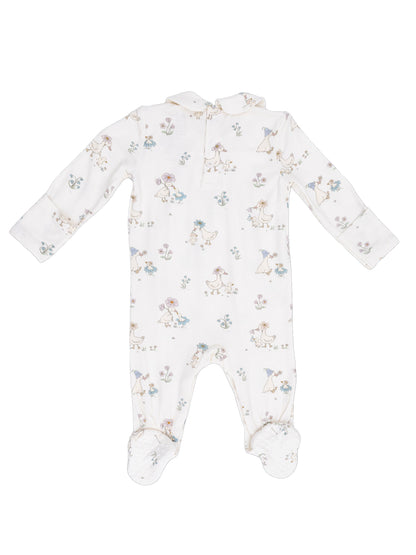Cream-colored baby onesie with whimsical floral and animal prints, featuring long sleeves and footed design.