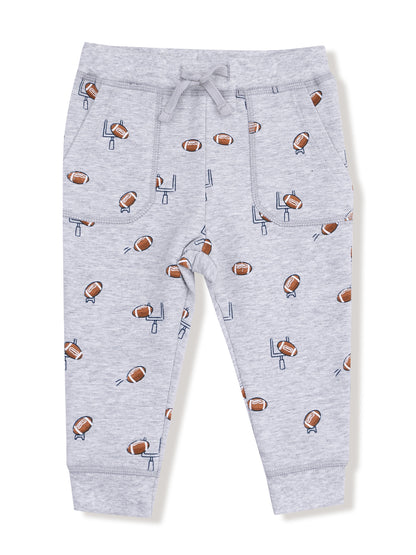 Gray sweatpants with a football print, featuring pockets and an adjustable drawstring waist.