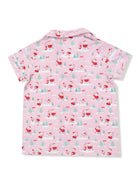 Pink short-sleeve shirt with a festive Santa and tree print, featuring a playful winter theme.