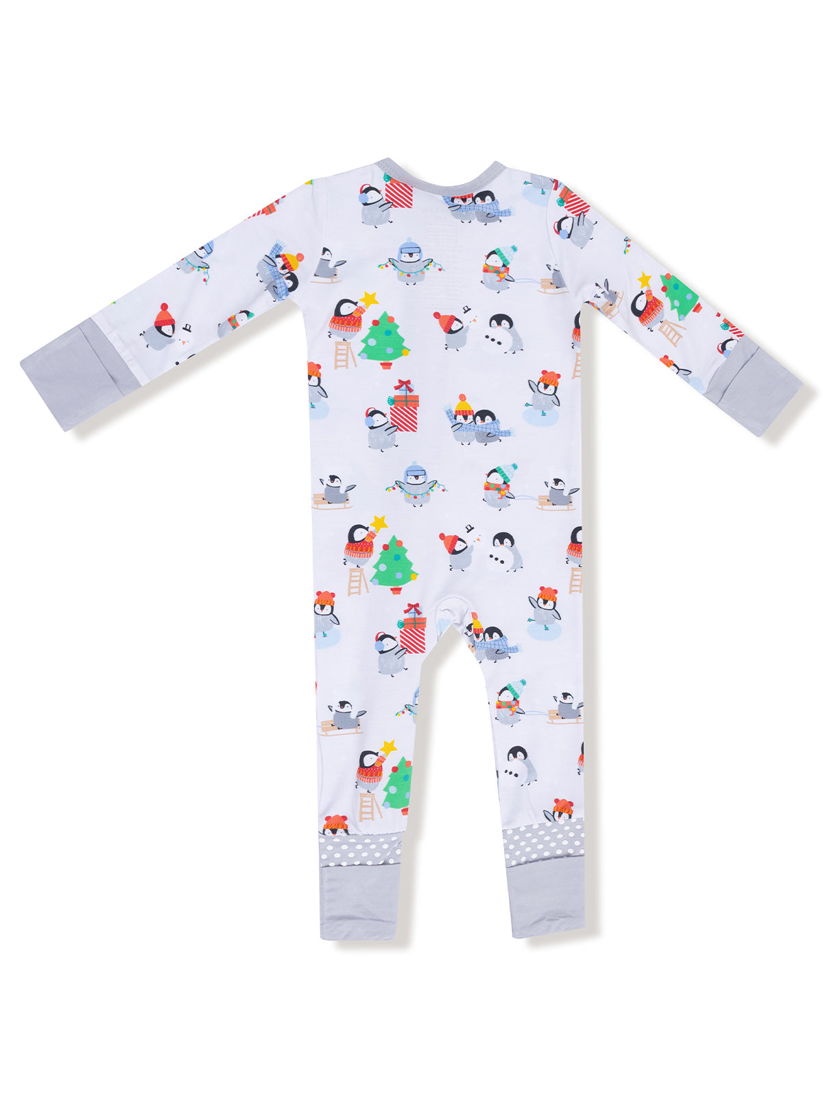 Winter-themed toddler pajamas featuring playful penguins, Christmas trees, and festive decorations.