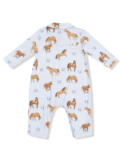 Light blue onesie with horse and horseshoe patterns, featuring long sleeves and a collar.
