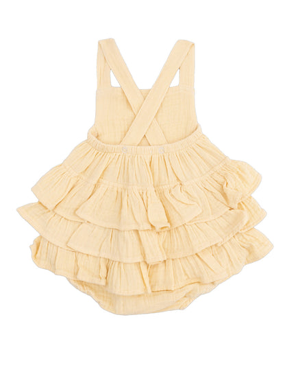 Yellow tiered dress with crisscross straps and ruffled layers for infants.