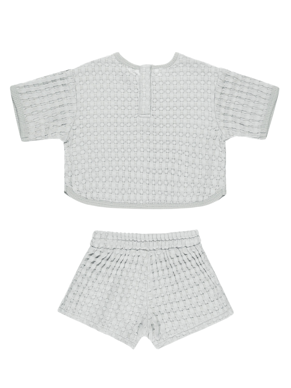 Light gray textured two-piece outfit featuring a short-sleeve top and matching shorts.