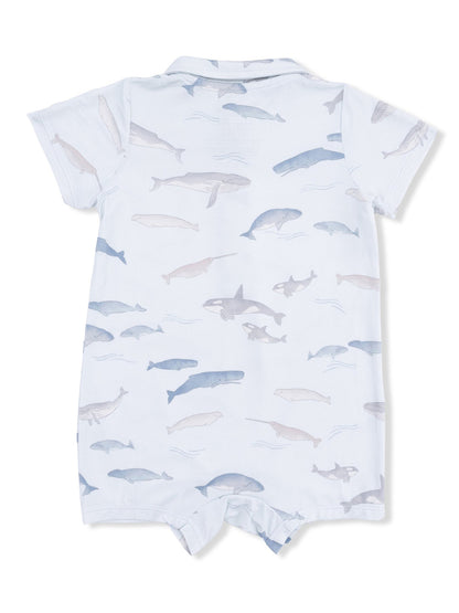 Light blue onesie featuring a playful pattern of various ocean animals, including whales and sharks.