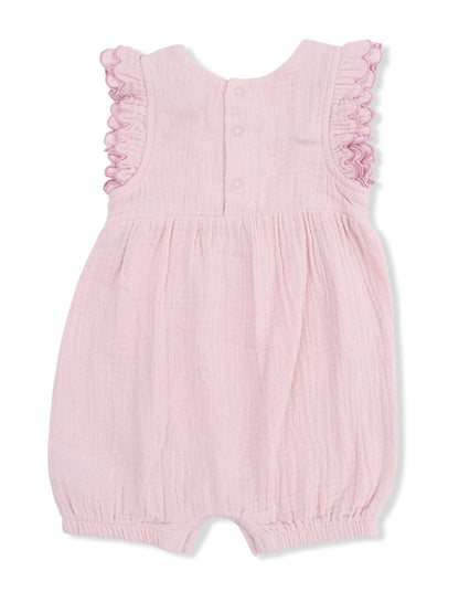 Light pink baby romper with ruffled sleeves and button closure on the back. Soft, breathable fabric.