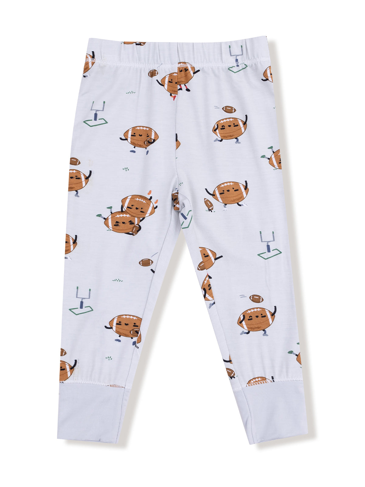 Kids' leggings with a playful football pattern on a light background; stretchy waistband for comfort.