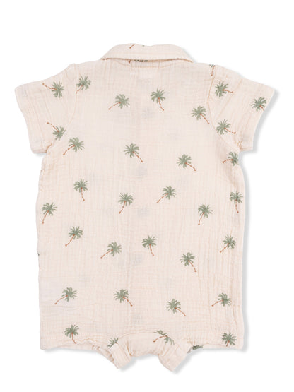 Light-colored infant romper with palm tree print and short sleeves. Ideal for warm weather.