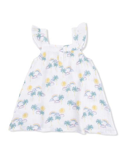 White dress with palm trees, rainbows, and suns, featuring ruffled straps and a relaxed fit. Perfect for summer.