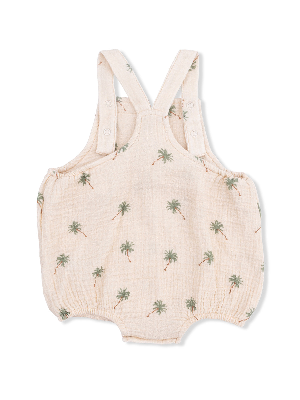 Light beige baby romper with green palm tree print and adjustable shoulder straps. Ideal for warm weather.