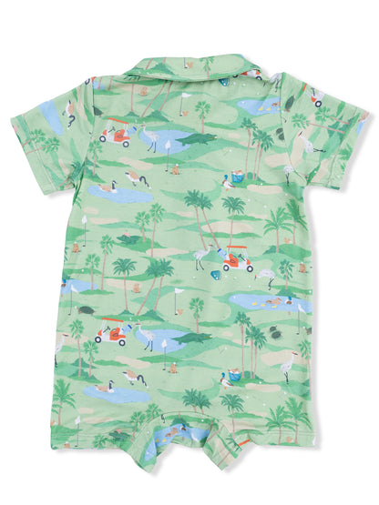 Green short-sleeve romper featuring a playful golf course scene with animals and palm trees.