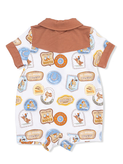 Children's cowboy-themed romper featuring playful graphics and a brown collar, ideal for playful outings.