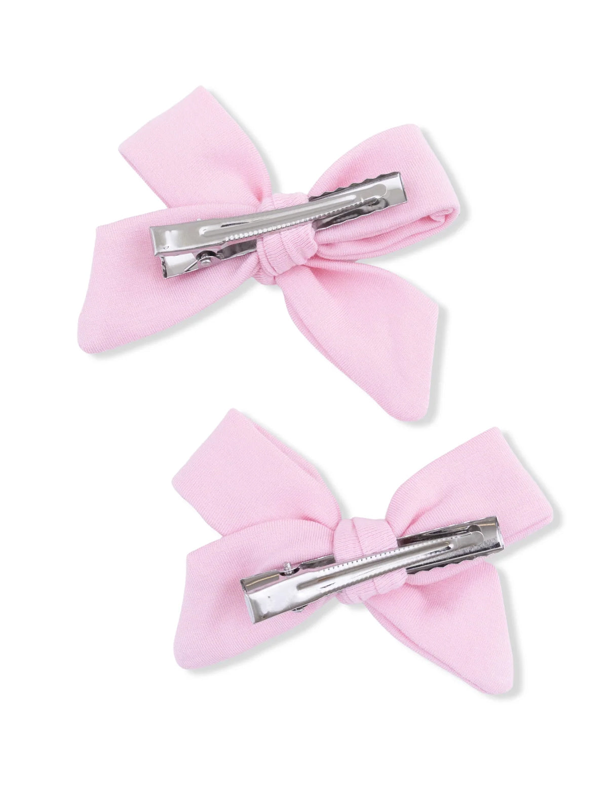 Two pink fabric hair bows with metal clips on the back.