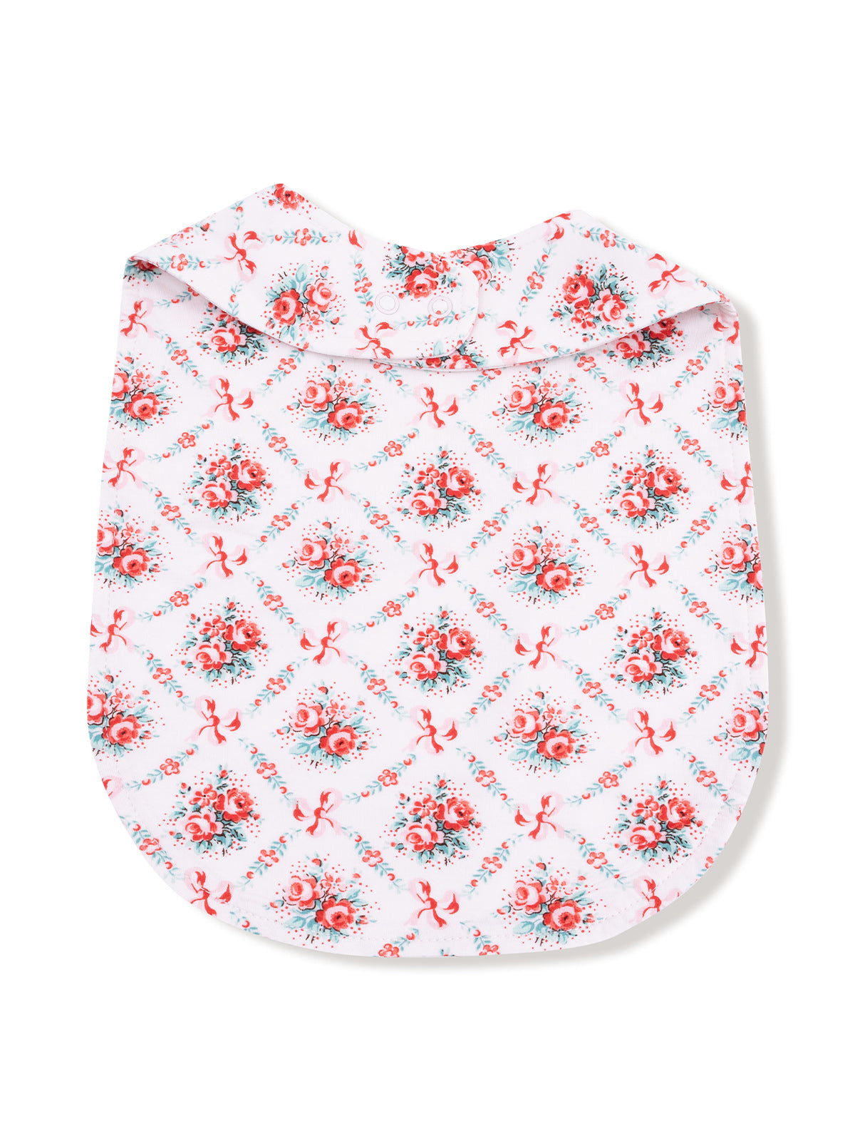 Floral patterned fabric featuring red roses on a white background with bows, designed for apparel.
