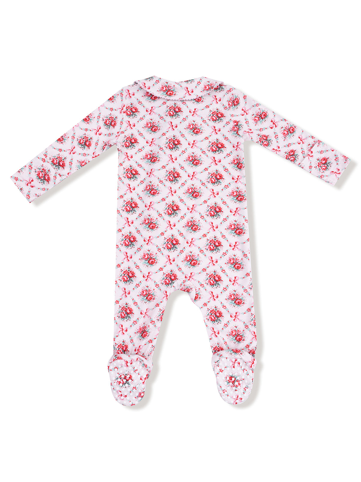 Back view of a floral patterned baby onesie with long sleeves and footed design.