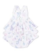 White baby dress with ruffled layers and pastel sea creature prints, featuring crisscross straps on the back.