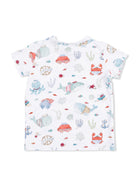Children's white t-shirt featuring playful sea animal prints, including whales, crabs, and colorful underwater elements.